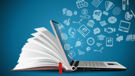 image of open book and laptop with icons streaming from it