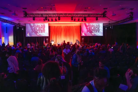 A large audience assembling in the Festival Grand Ballroom for the Furious Flower Conference