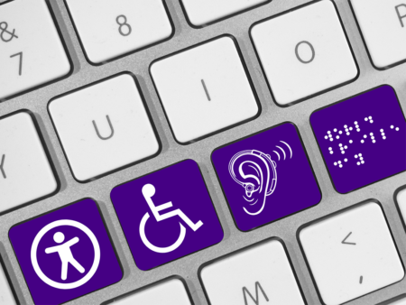 an image of a computer keyboard with purple and white images on some of the keys; the images are implying accessibility concepts
