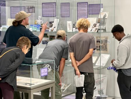 people looking at an exhibit